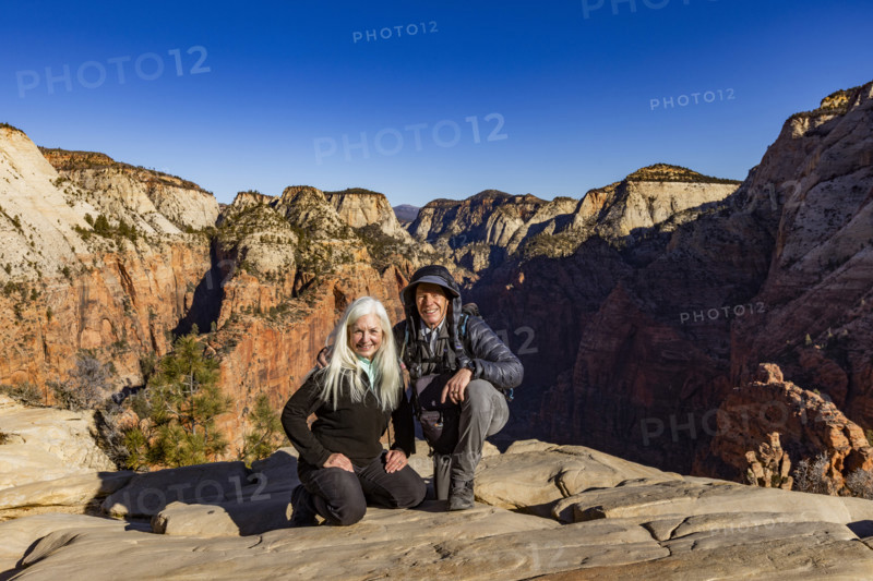 Portrait of senior couple atop Angels Landing, Zion National Park, Utah, USA.