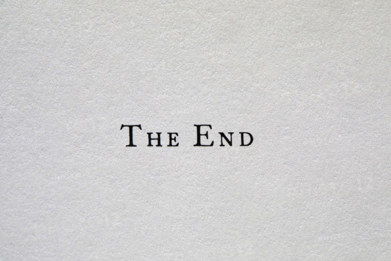 The End typed on white paper, New York City, New York, USA.
