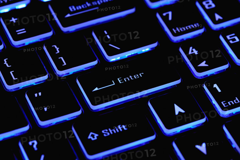 Close-up of laptop keyboard with Enter key, New York City, New York, USA.