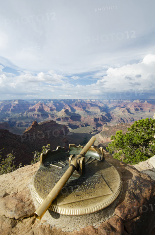 Telescope set on rock in South Rim of the Grand Canyon National Park, Grand Canyon Village, Arizona, USA.