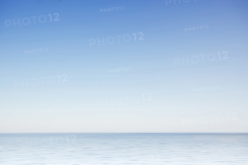 Clear morning sky above calm surface of North Atlantic, Nantucket, Massachusetts, USA.