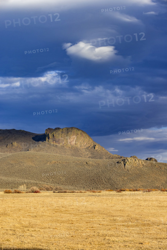Clouds above hills in late afternoon