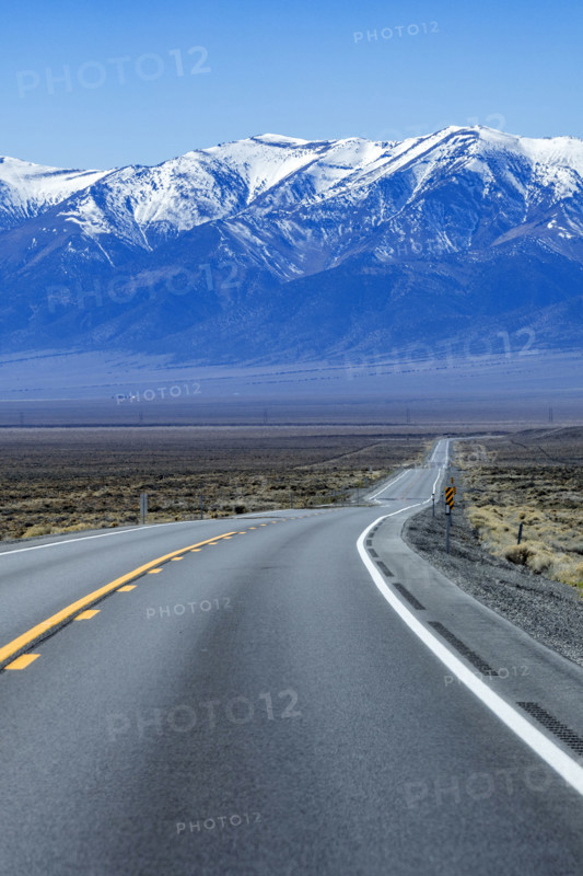 To lane highway leading to mountains