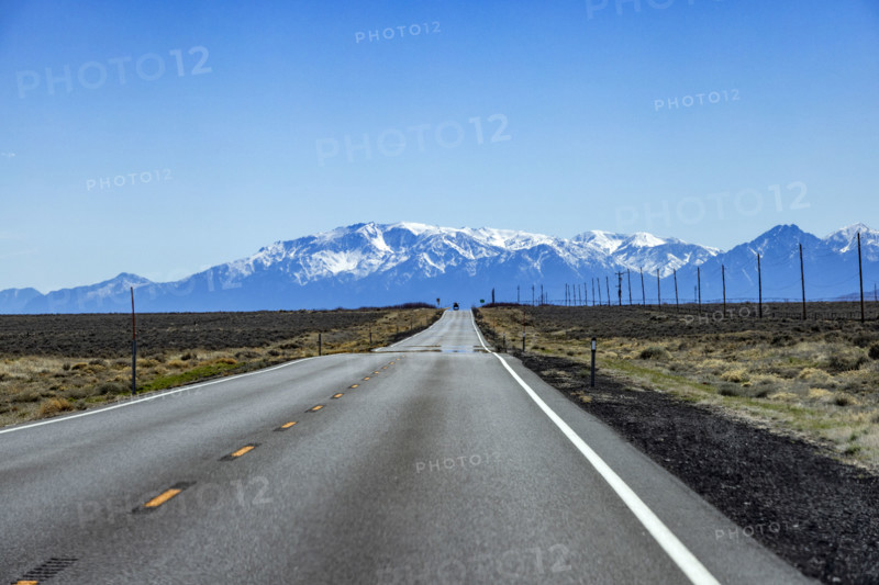To lane highway leading to mountains