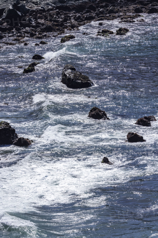 Ocean waves washing rocky coast