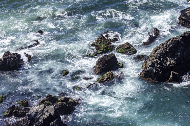 Waves crashing against rocky Big Sur Coast