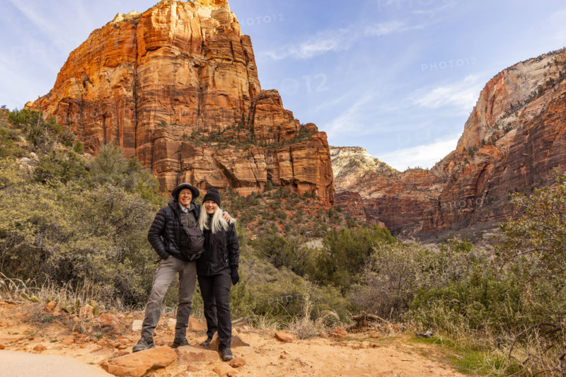Portrait of senior couple with Angels Landing formation in background