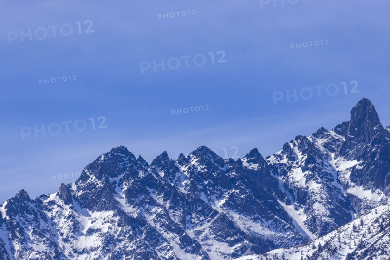 Rugged Eastern Sierra Nevada mountains against blue sky