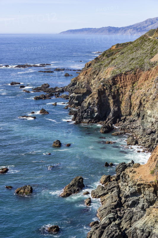 Ocean waves crashing against rocky Big Sur Coast