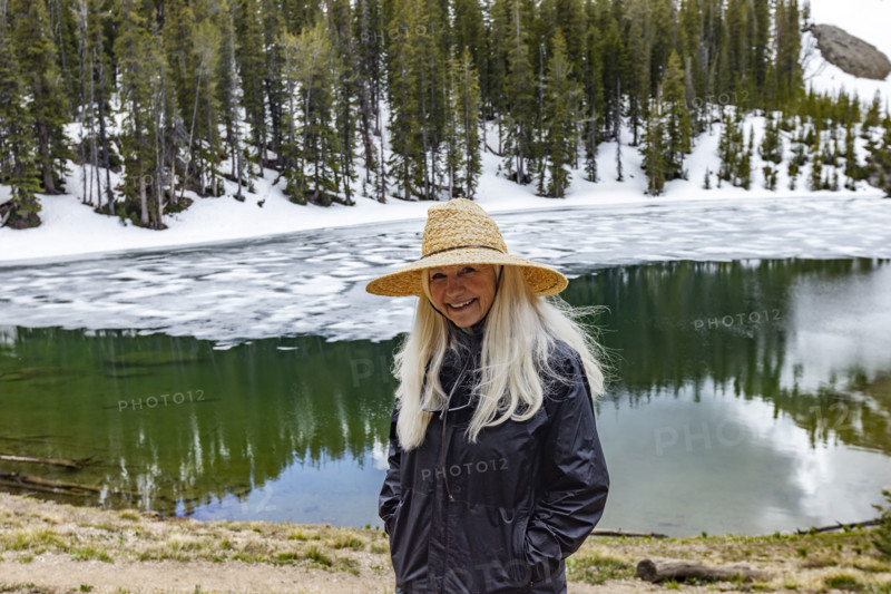 Portrait of smiling woman by Norton Lake in Sun Valley