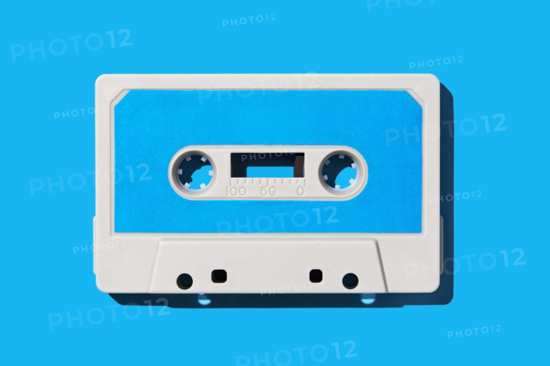 Cassette tape on blue background