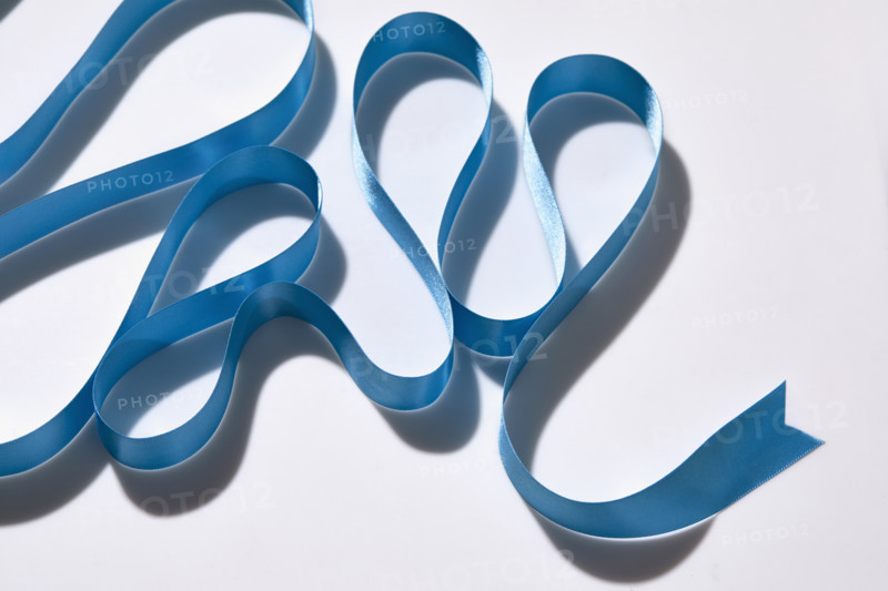 Blue ribbon on white background