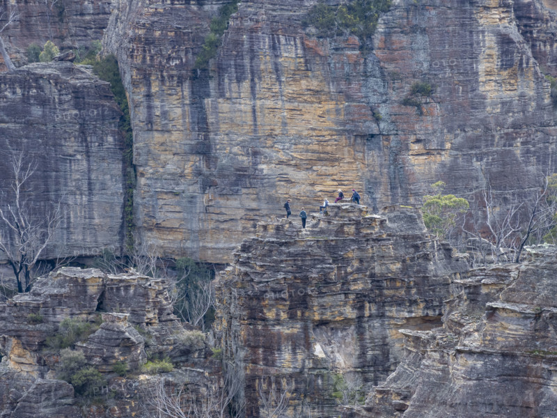 Group of hikers on top of Pagoda rock formation