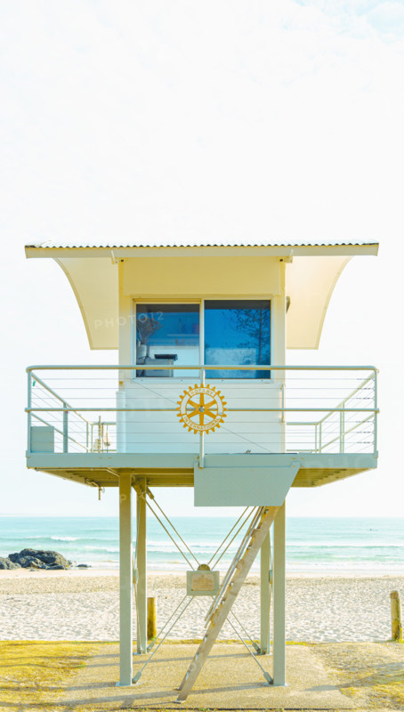 Lifeguard tower on empty beach