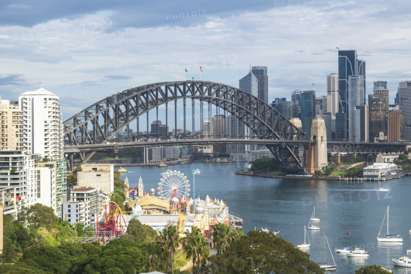 Sydney Harbour with amusement park and Harbour Bridge