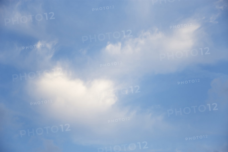 Soft white clouds against blue sky