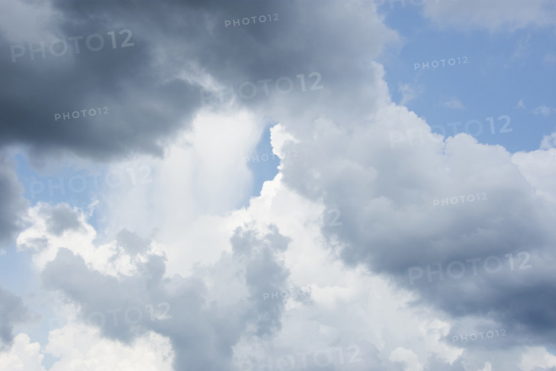 Rain shower falling from cumulonimbus cloud