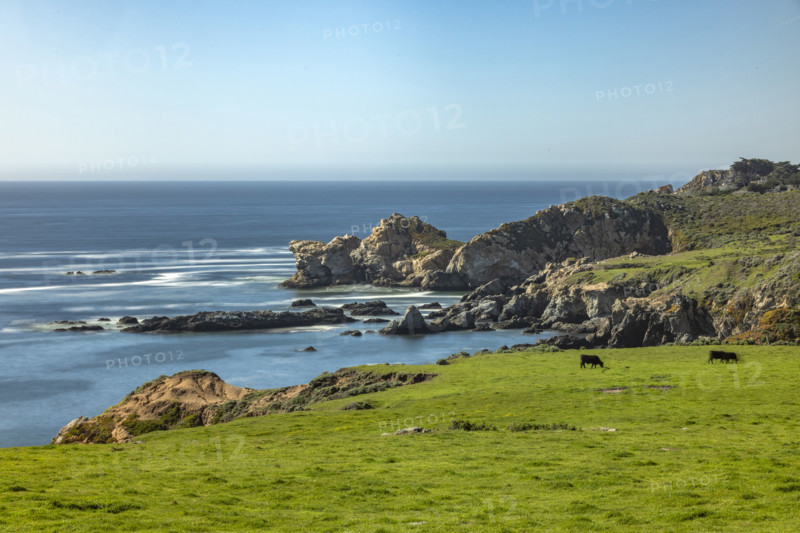 Calm ocean and rocky coast