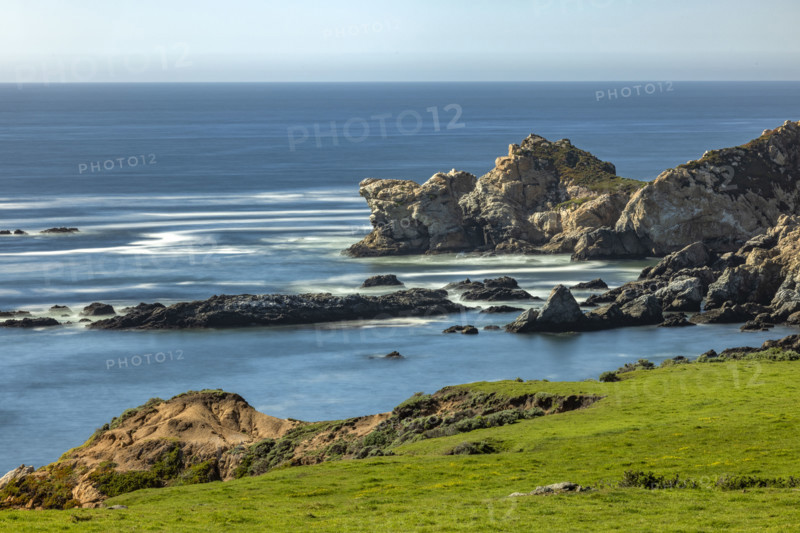 Calm ocean and rocky coast