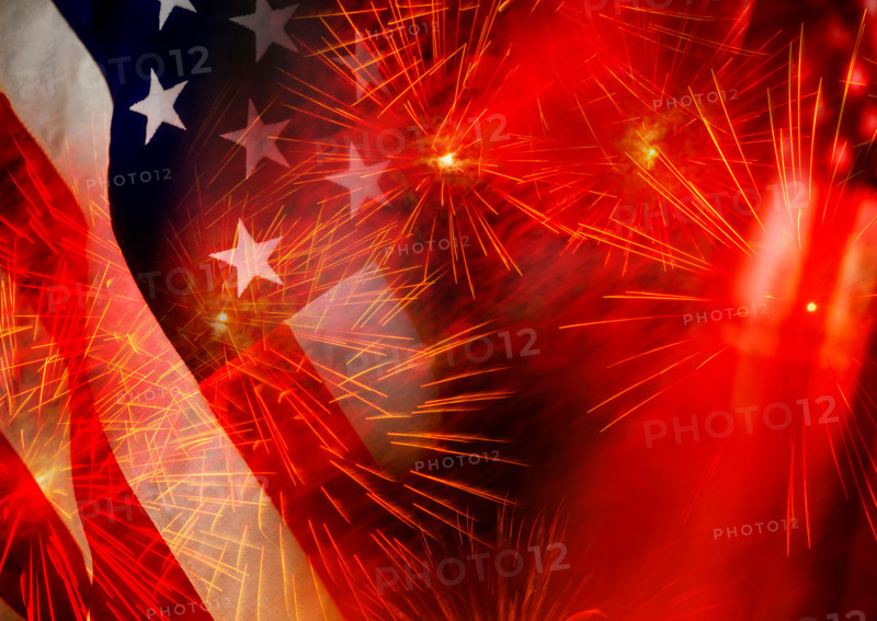 Close-up of American flags and fireworks. Washington, Washington DC, United States