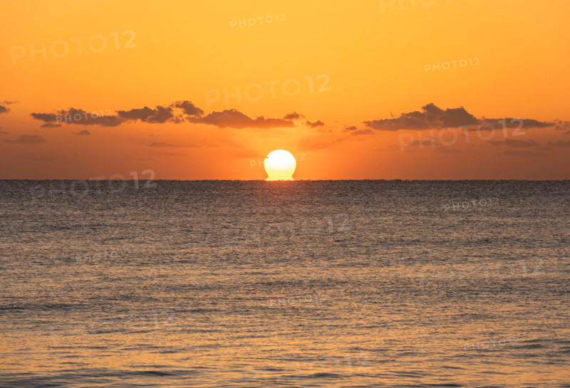 Sun rising over calm ocean. Boca Raton, Florida, United States