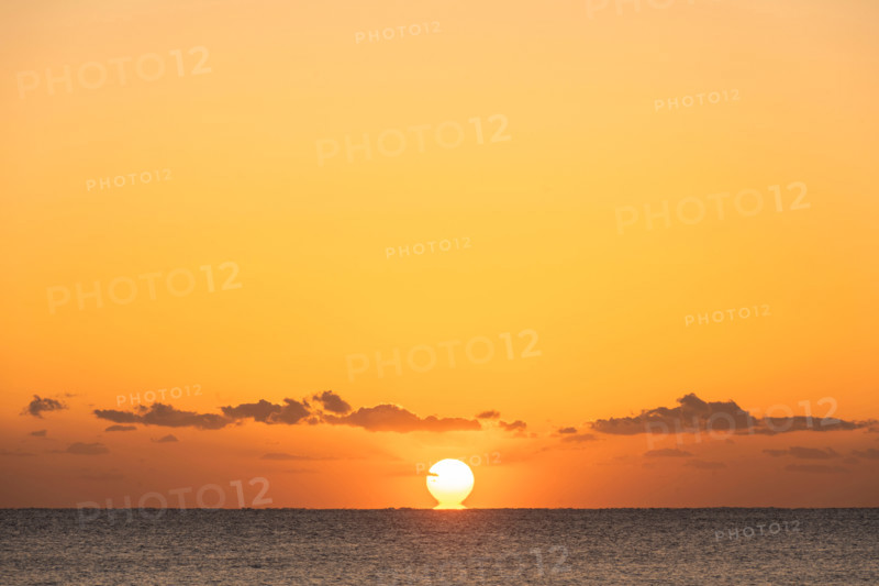 Sun rising over calm ocean. Boca Raton, Florida, United States