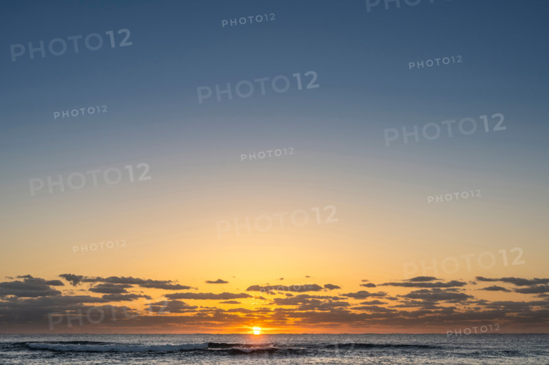 Sun rising over calm ocean. Boca Raton, Florida, United States