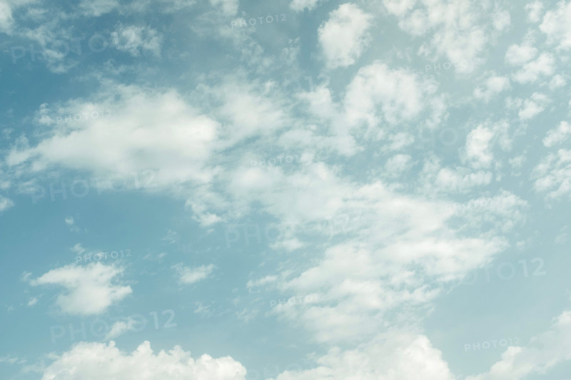 White puffy clouds against blue sky. San Sebastian, Gipuzkoa, Spain
