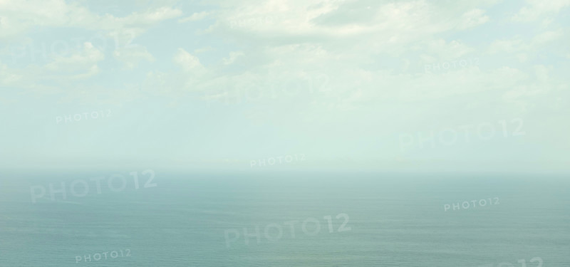 Sky above calm sea in fog. San Sebastian, Gipuzkoa, Spain