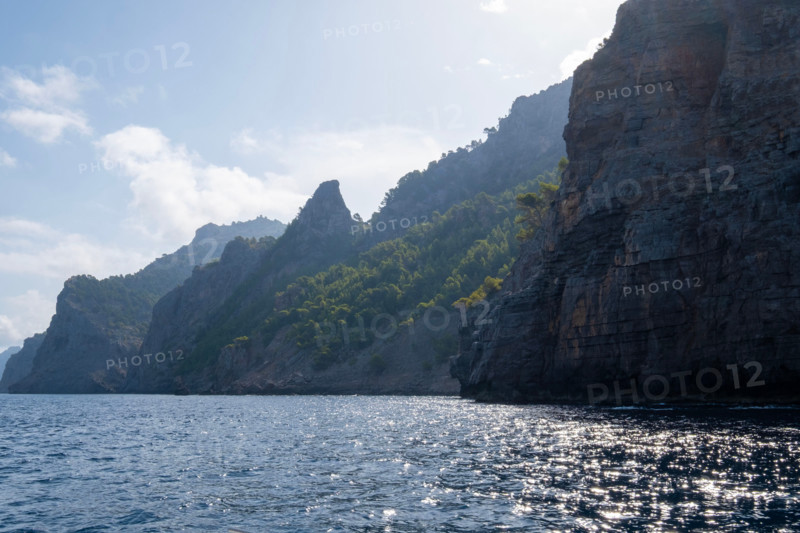 Calm sea and cliffs on sunny day. , Mallorca, Spain