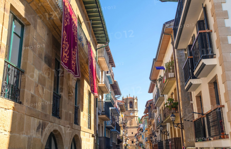 Townhouses and San Salvador church tower. Getaria, Gipuzkoa, Spain