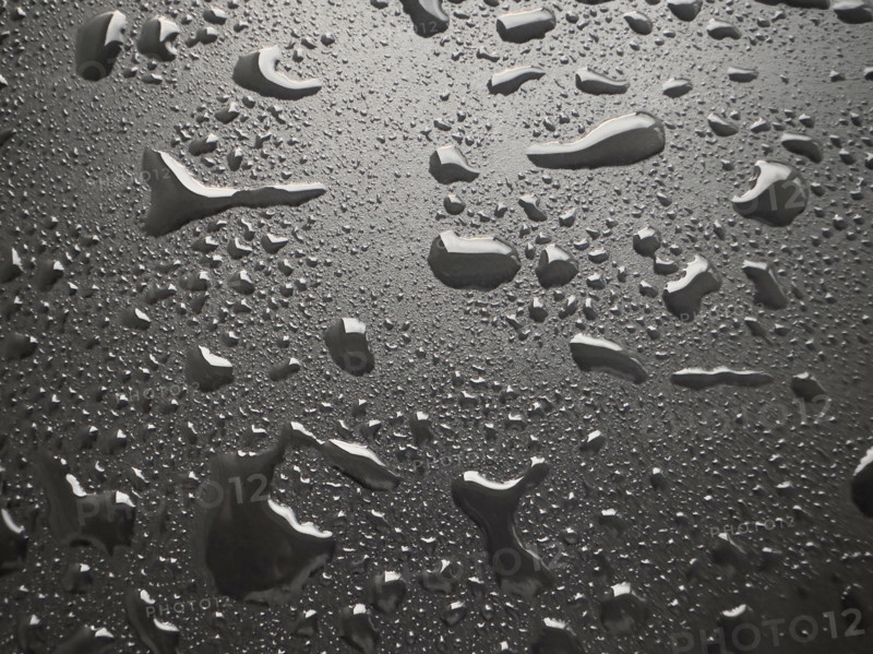 Water droplets on black metal surface. Nashville, Tennessee, United States