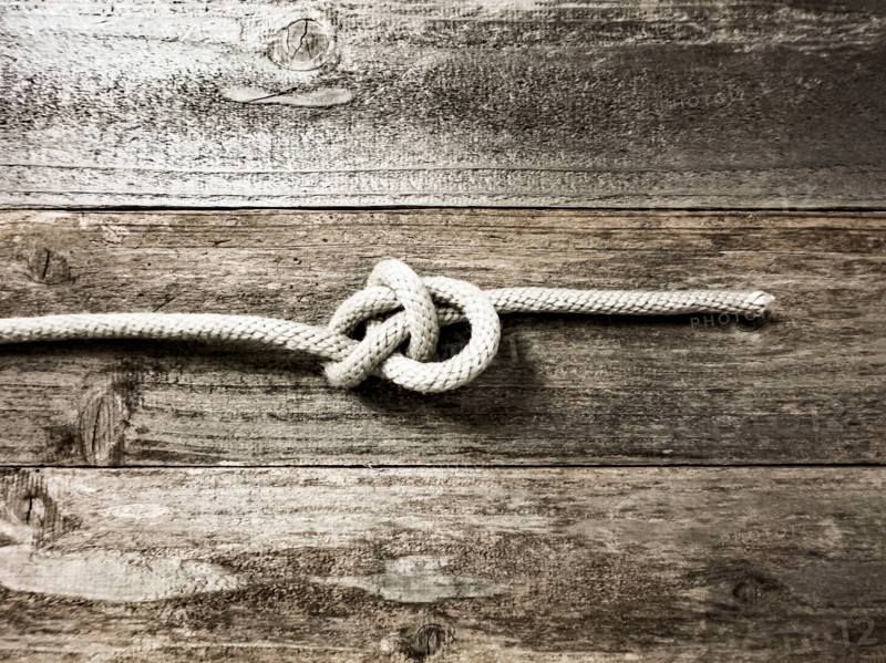 Bow line knot on wooden surface. Nantucket, Massachusetts, United States