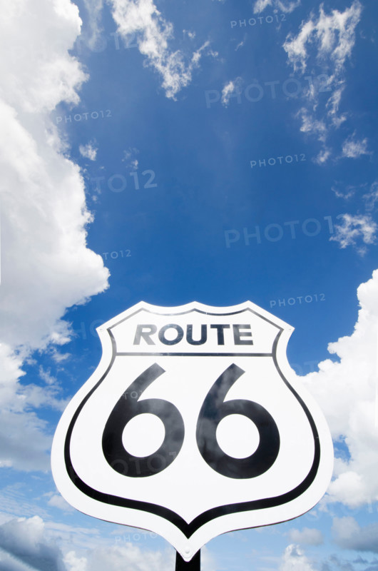 Low angle view of Route 66 sign against sky. Williams, Arizona, United States