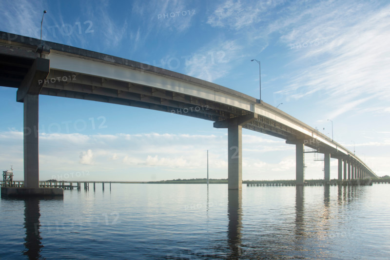 Apalachicola River Bridge crossing calm river. Apalachicola, Florida, United States