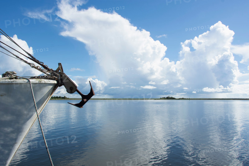 Fishing boat bow on calm Apalachicola River. Apalachicola, Florida, United States