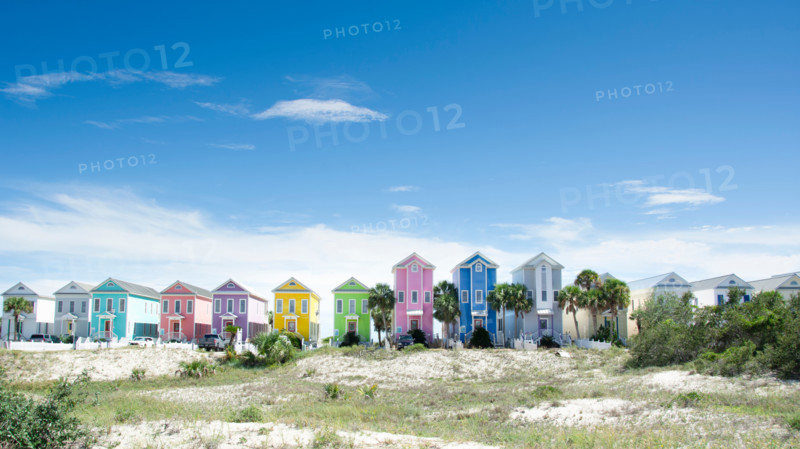 Row of colorful beach houses on sunny day. St. George Island, Florida, United States