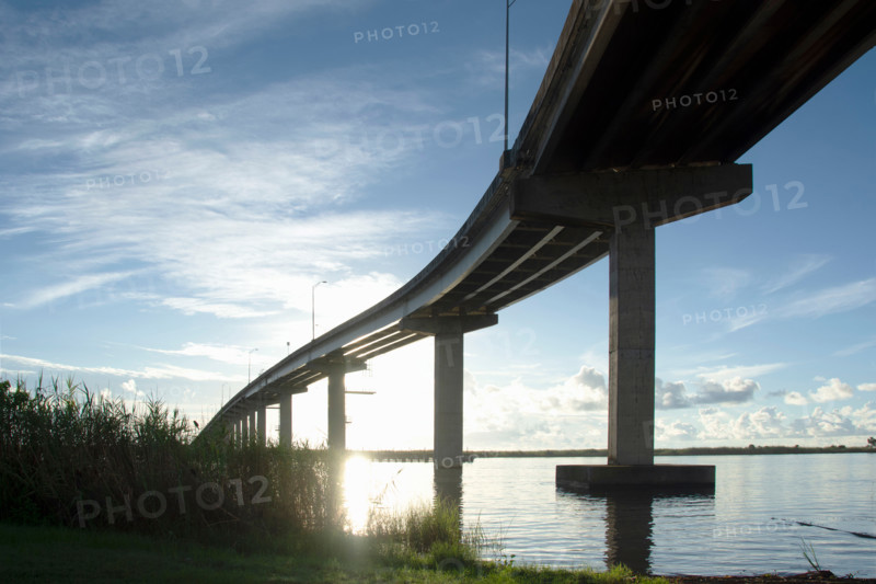 Low angle view of Apalachicola Bridge at sunrise. Apalachicola, Florida, United States