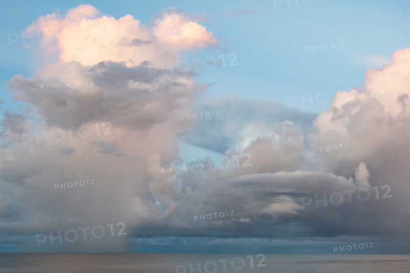 Storm clouds over calm Gulf of Mexico. St. George Island, Florida, United States