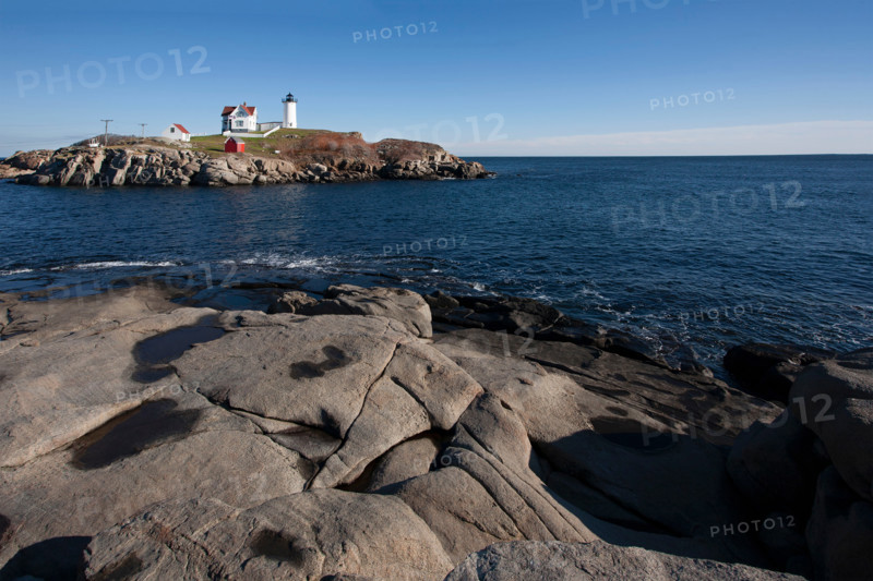 Rocky coast and Nubble Lighthouse. York, Maine, United States