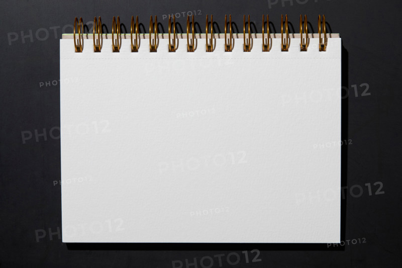 Blank notebook on black background. New york City, New York State, United States