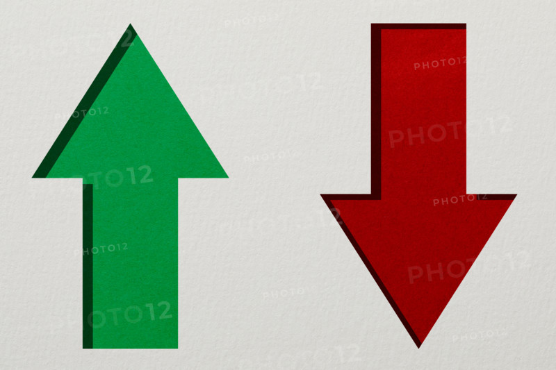Red and green arrows on white textured background. New York City, New York State, United States
