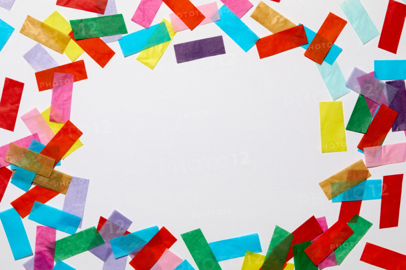 Colorful confetti on white background. New York City, New York State, United States