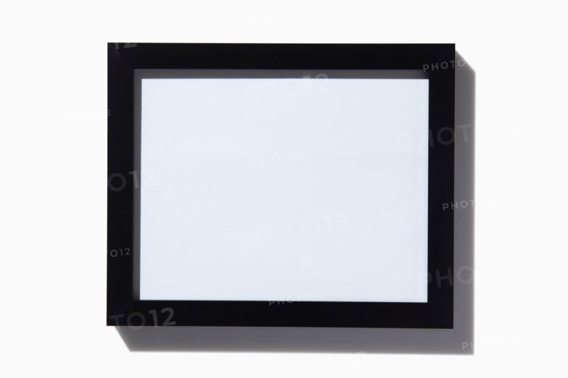 Black picture frame on white background. New York City, New York State, United States