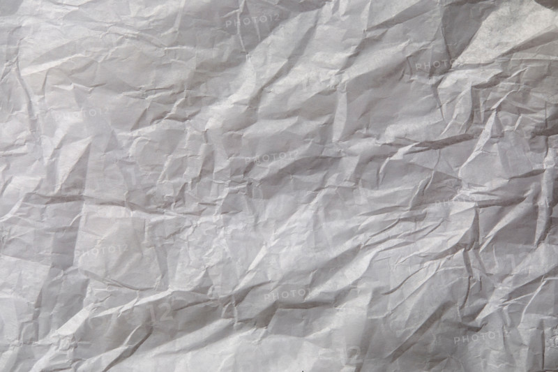 Close-up of white wrinkled paper. New York City, New York State, United States
