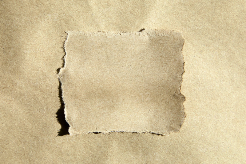 Studio shot of torn blank craft paper. New York City, New York State, United States