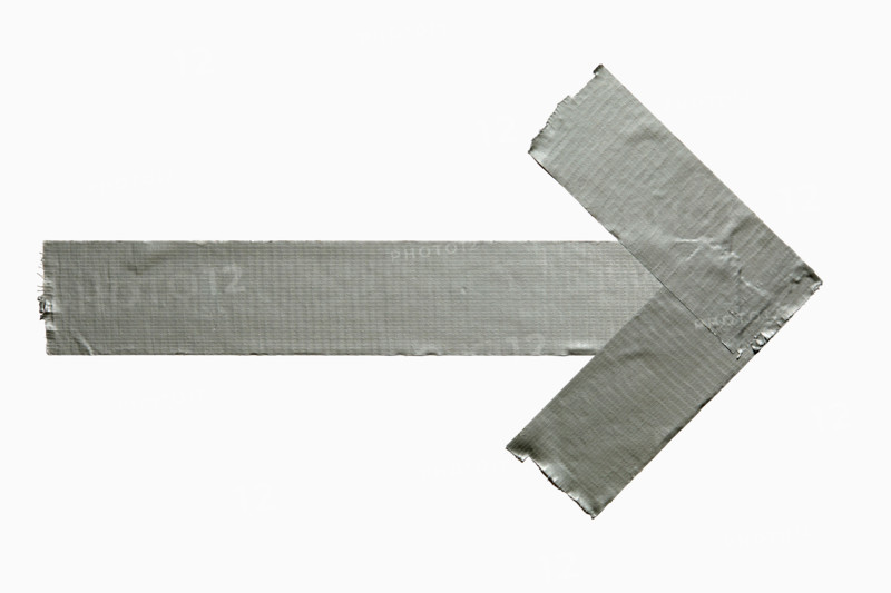 Duct tape in shape of arrow on white background. New York City, New York State, United States