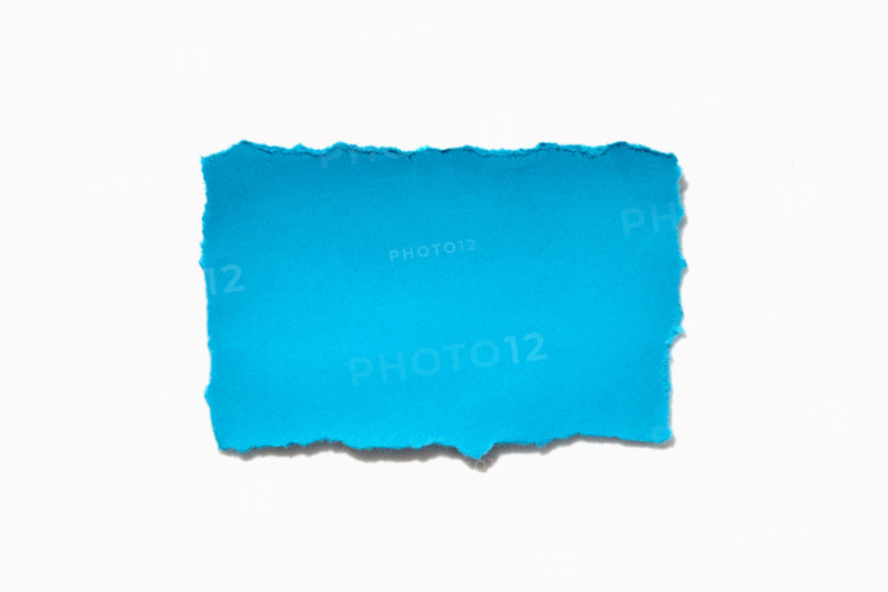 Torn blue Paper on white background. New York City, New York State, United States