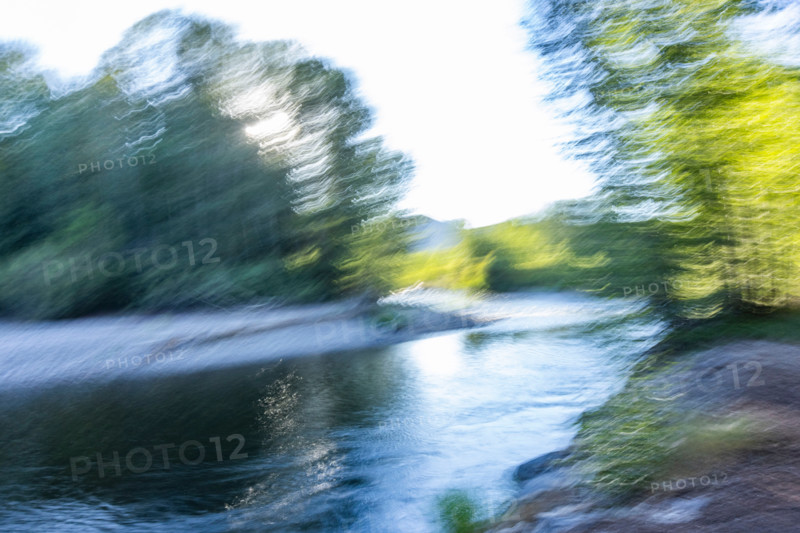 Calm river and trees, blurred motion. Bellevue, Idaho, United States