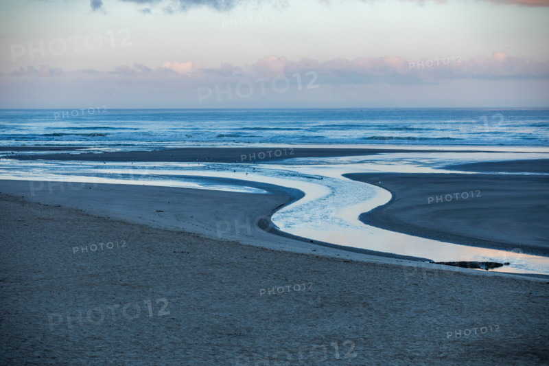 Ecola Creek flowing into Pacific Ocean. Cannon Beach, Oregon, United States